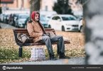 depositphotos_228395396-stock-photo-homeless-beggar-man-with-a.jpg